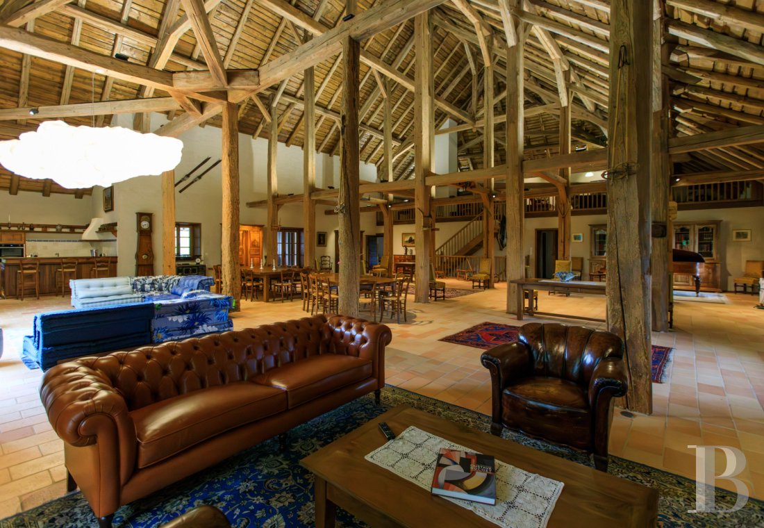 A former livestock farm which has been transformed into a vast, comfortable home near to Nantua in the Haut-Bugey region - photo  n°20